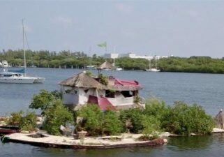 Man Builds Floating Tropical Island Paradise on 150,000 Recycled Plastic Bottles